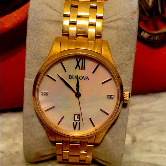 Gold Bulova watch